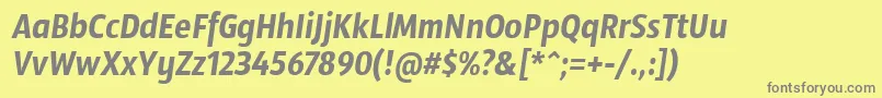 SansusWebissimoItalic-fontti – harmaat kirjasimet keltaisella taustalla