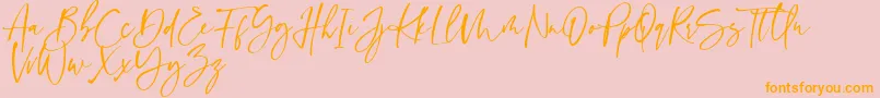 Sinthya Font – Orange Fonts on Pink Background