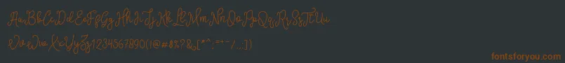 SinyakScript Font – Brown Fonts on Black Background