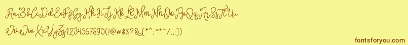 SinyakScript-Schriftart – Braune Schriften auf gelbem Hintergrund