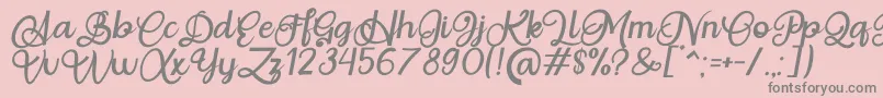 Situgintu Calligraphy Personal Use-fontti – harmaat kirjasimet vaaleanpunaisella taustalla