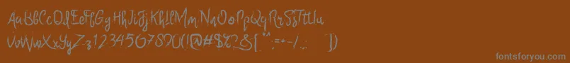 フォントSix Only – 茶色の背景に灰色の文字