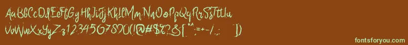 フォントSix Only – 緑色の文字が茶色の背景にあります。