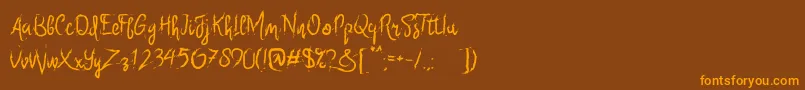 フォントSix Only – オレンジ色の文字が茶色の背景にあります。