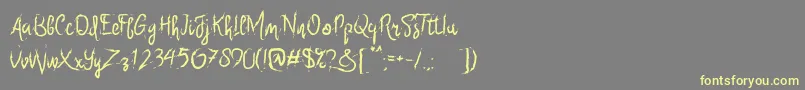 Six Only Font – Yellow Fonts on Gray Background