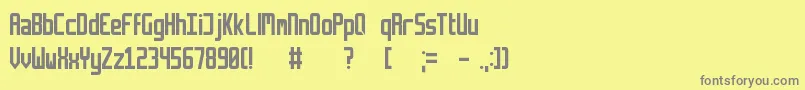 フォントRetriga – 黄色の背景に灰色の文字