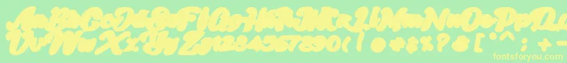 Skatter Base Font – Yellow Fonts on Green Background