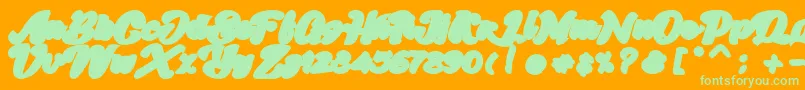 Skatter Base Font – Green Fonts on Orange Background