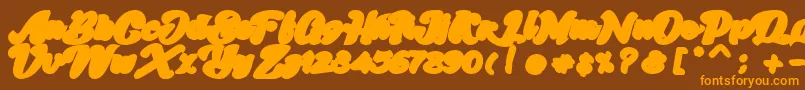 Skatter Base Font – Orange Fonts on Brown Background