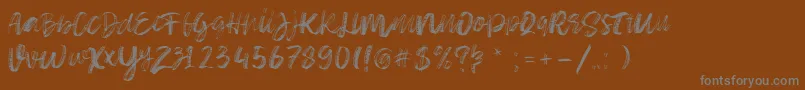 Шрифт Sketch Time Demo – серые шрифты на коричневом фоне