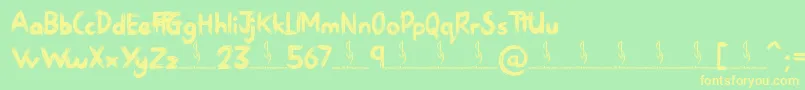 フォントSketchy Night – 黄色の文字が緑の背景にあります