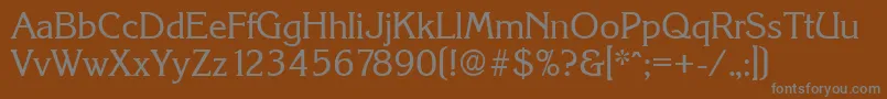 KorinthSerialRegularDb-fontti – harmaat kirjasimet ruskealla taustalla