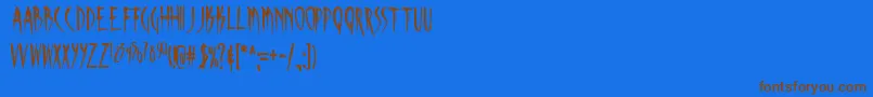 フォントSKINA    – 茶色の文字が青い背景にあります。
