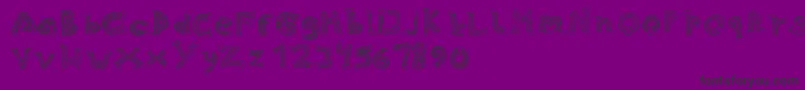 フォントSkinny Jeans – 紫の背景に黒い文字