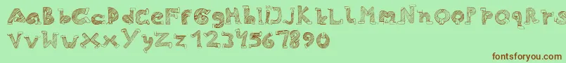 フォントSkinny Jeans – 緑の背景に茶色のフォント