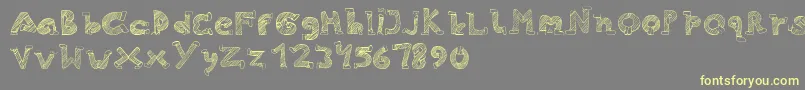 Skinny Jeans-fontti – keltaiset fontit harmaalla taustalla