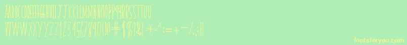 skinnyserifV2-fontti – keltaiset fontit vihreällä taustalla