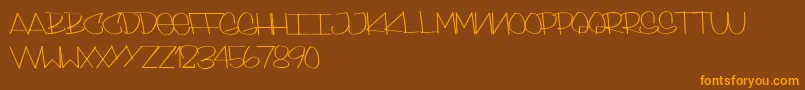 SkinnyStyle-Schriftart – Orangefarbene Schriften auf braunem Hintergrund