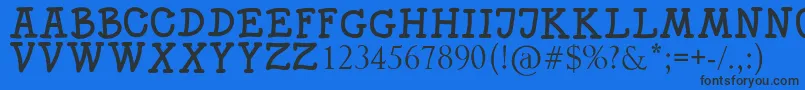 SKITTLE Font – Black Fonts on Blue Background