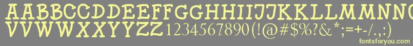 SKITTLE Font – Yellow Fonts on Gray Background