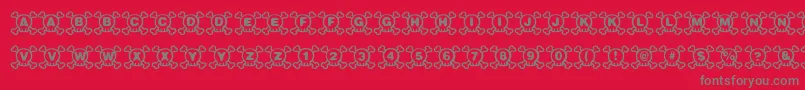フォントSkully – 赤い背景に灰色の文字