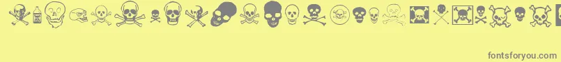 Fonte skullz – fontes cinzas em um fundo amarelo