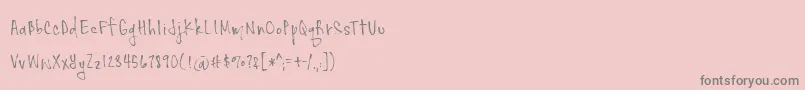 Fonte Skydancer Demo – fontes cinzas em um fundo rosa