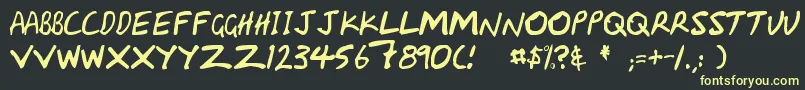 Handcapzz Font – Yellow Fonts on Black Background