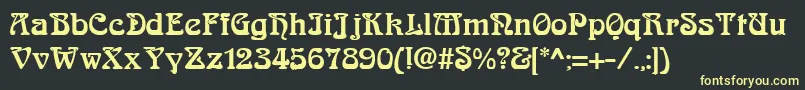 フォントAskedalRegular – 黒い背景に黄色の文字