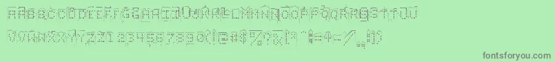 フォントskylinesketch – 緑の背景に灰色の文字