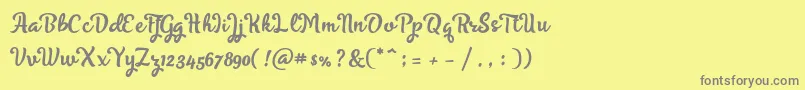 Skyoval Typeface Free Demo Font – Gray Fonts on Yellow Background