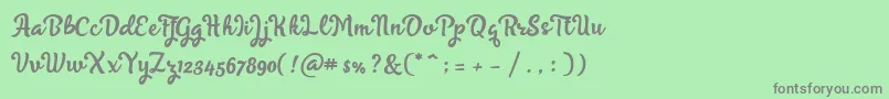 Czcionka Skyoval Typeface Free Demo – szare czcionki na zielonym tle