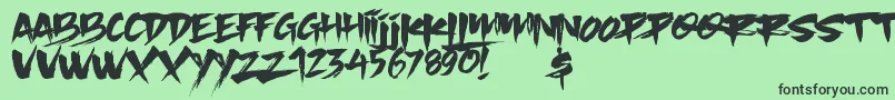 フォントSlacker Brush – 緑の背景に黒い文字