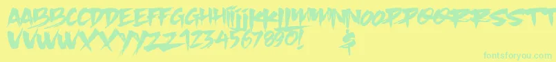 Slacker Brush Font – Green Fonts on Yellow Background