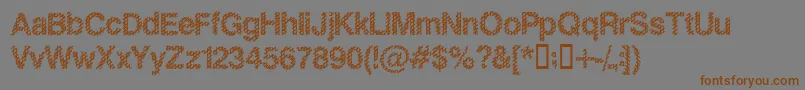 フォントSLANKB   – 茶色の文字が灰色の背景にあります。