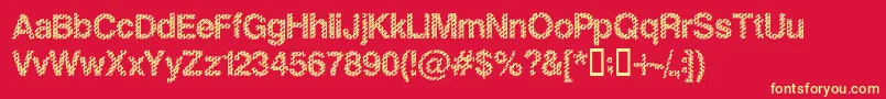 Fonte SLANKB   – fontes amarelas em um fundo vermelho