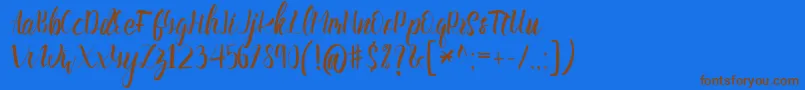 Slash Bold-Schriftart – Braune Schriften auf blauem Hintergrund