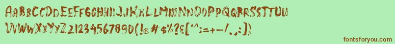 SlasZ Brush Font – Brown Fonts on Green Background
