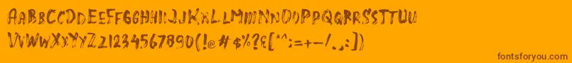 Fonte SlasZ Brush – fontes marrons em um fundo laranja