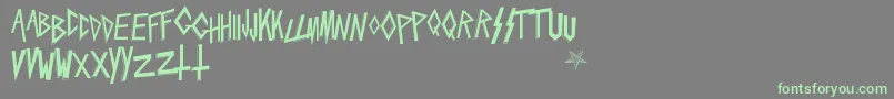 Slaytanic Font – Green Fonts on Gray Background
