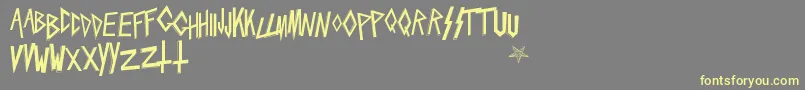 Slaytanic Font – Yellow Fonts on Gray Background