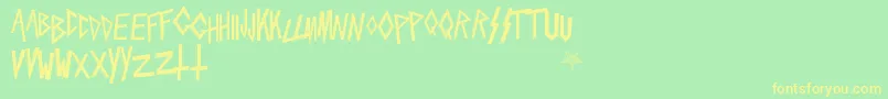 Slaytanic Font – Yellow Fonts on Green Background