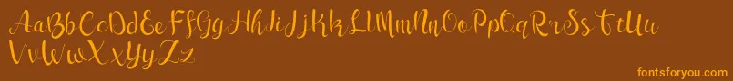 sleeper-Schriftart – Orangefarbene Schriften auf braunem Hintergrund