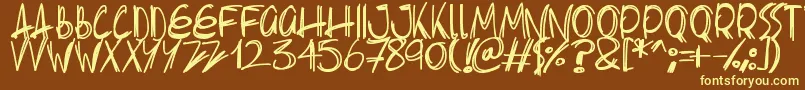 Fonte Slenderscratch – fontes amarelas em um fundo marrom