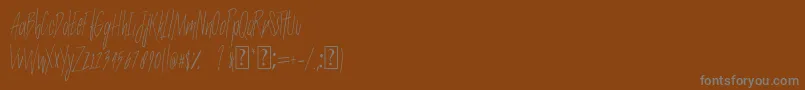 フォントSlenderThin – 茶色の背景に灰色の文字