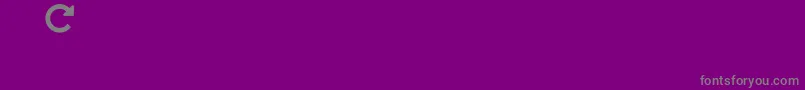 slick-fontti – harmaat kirjasimet violetilla taustalla