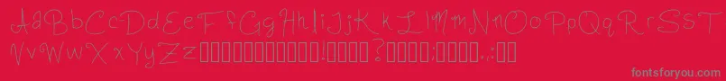 Czcionka SlightlyCursiveCharacters Regular – szare czcionki na czerwonym tle