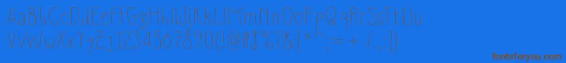 Slimamif Font – Brown Fonts on Blue Background