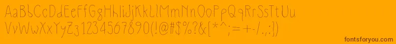Slimamif Font – Brown Fonts on Orange Background