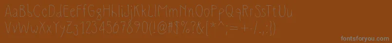 Slimamif Font – Gray Fonts on Brown Background